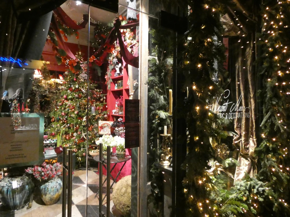 The shops and streets are filled with colorful Christmas decoration.